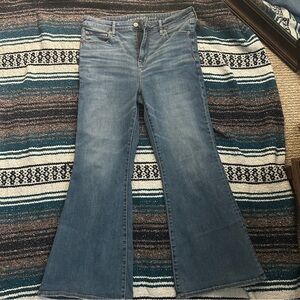 American eagle super hi rise flare light wash size 10 x short